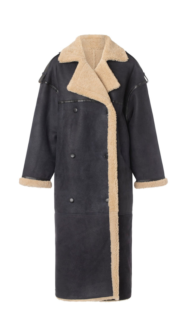 Cozy black shearling coat with a plush beige lining and oversized fit, perfect for stylish warmth this season by MEOTINE.