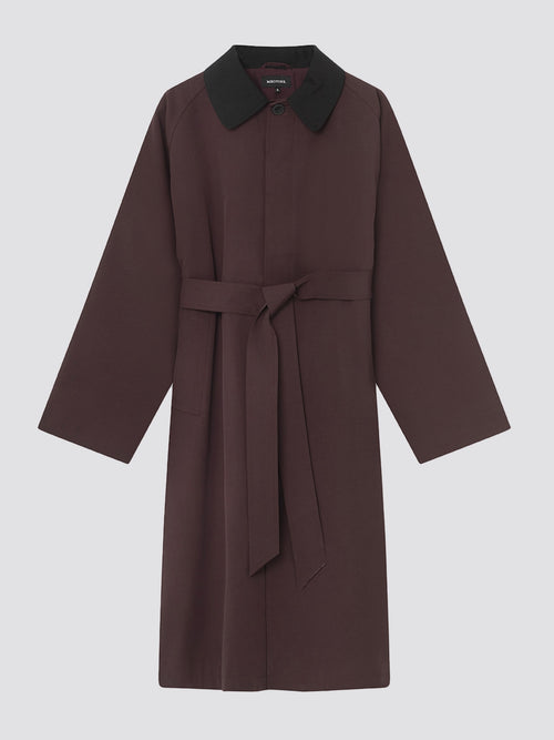 Stylish brown coat with a black collar and a belt, perfect for layering. Designed by MEOTINE for a chic look.