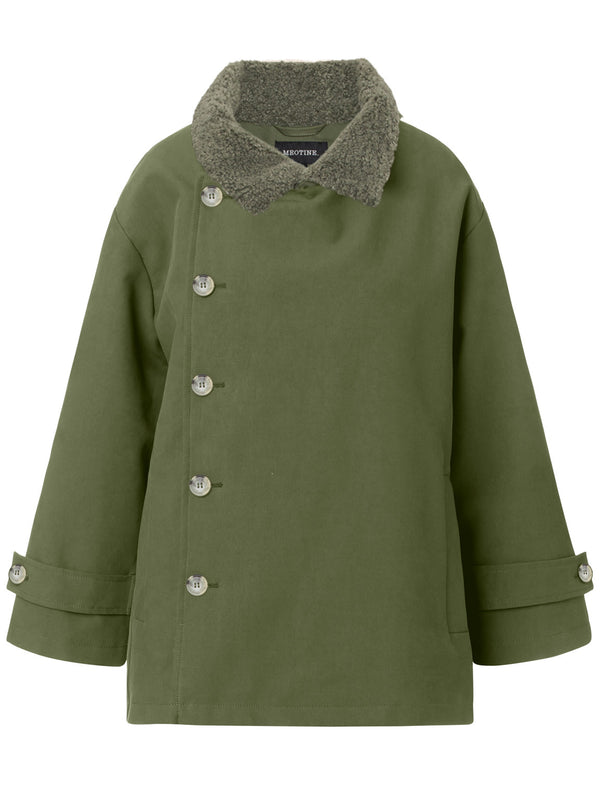 Green oversized jacket with a cozy fur collar and button details, perfect for stylish warmth. MEOTINE offers comfort and elegance.